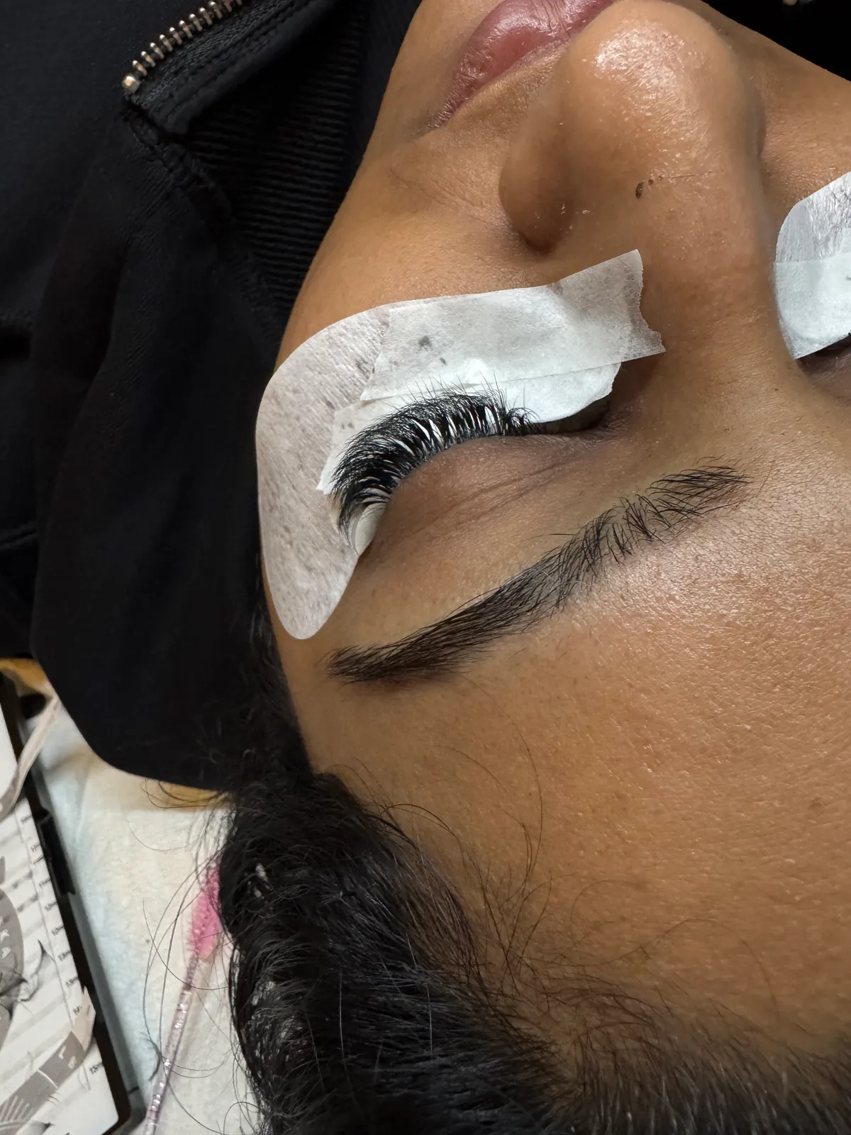 Eyelash extensions being applied in Sahej's Guelph lash studio